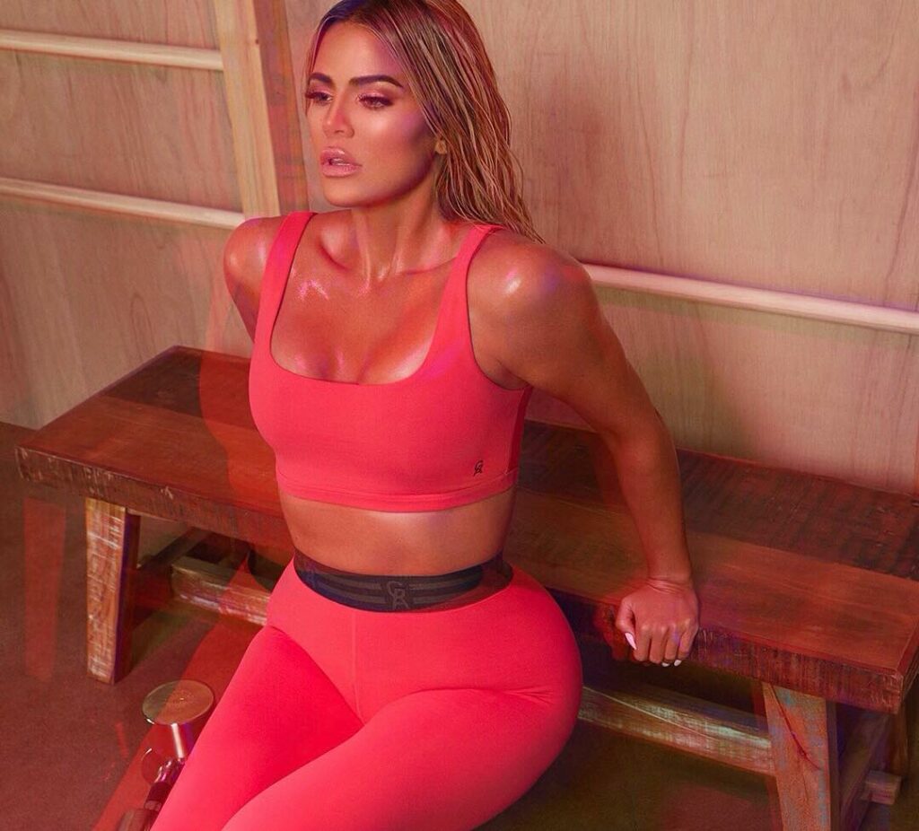 Feeling strong and healthy after baby in my @goodamerican coral sports bra and l...