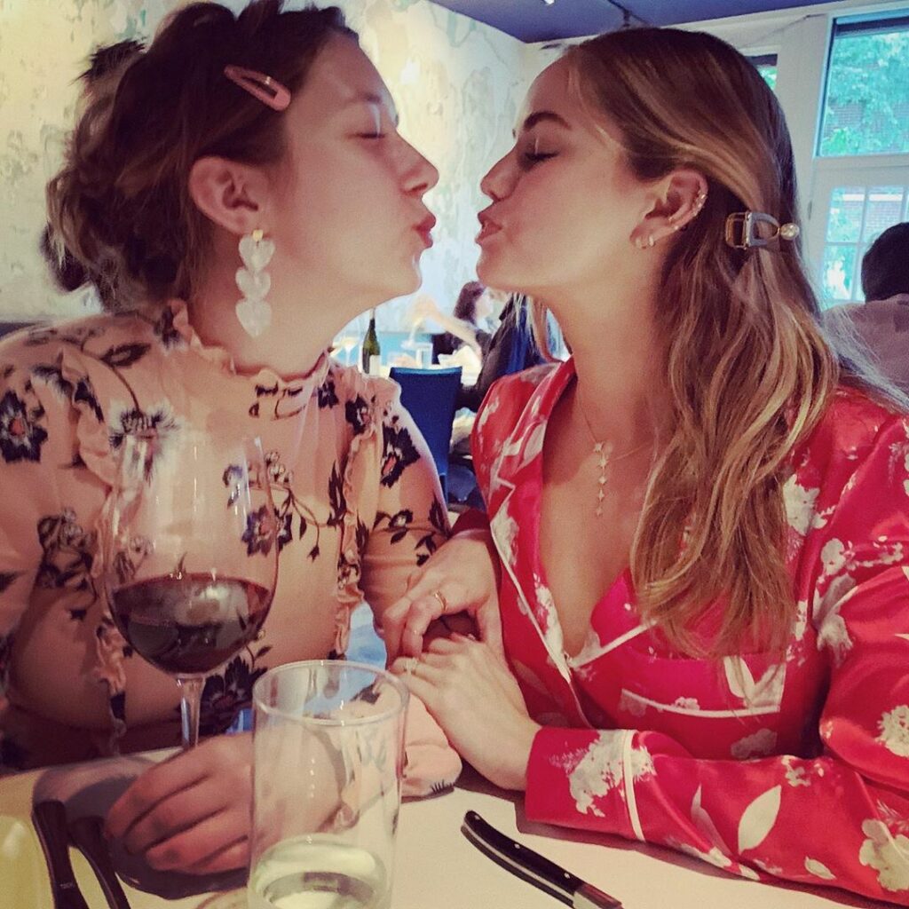 I like that she has a glass of wine and I have a knife...