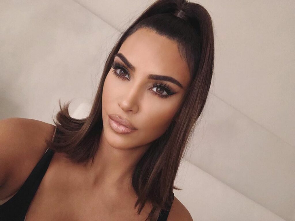 wearing @kkwbeauty x Winnie gloss in Aura over Classic Icon Lip Liner KKWBEUATY...