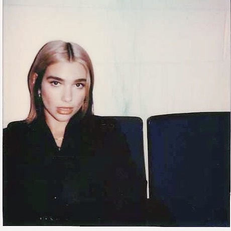 I’ve signed some polaroids we shot in New York last week... top lip not included...