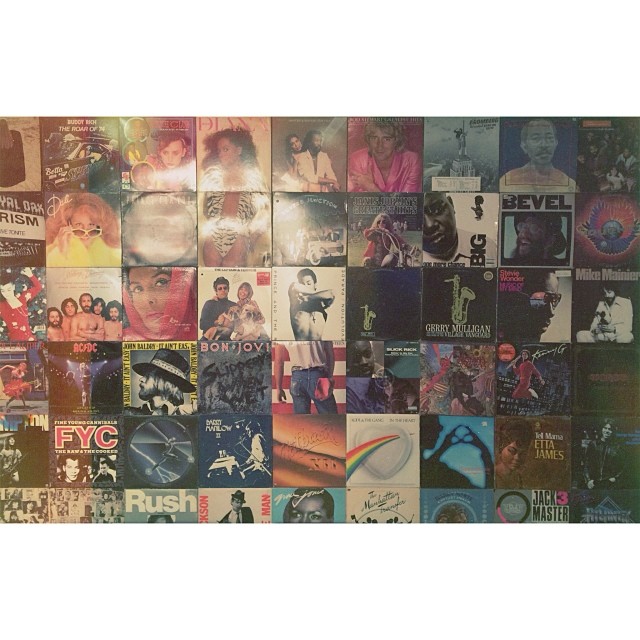 wall of album covers at @huffpostlive. their beverage game is on point....