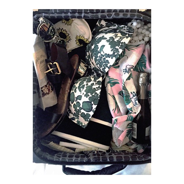 essentials on holiday // swimsuit, granola, sandals, and a whole bouquet of prin...