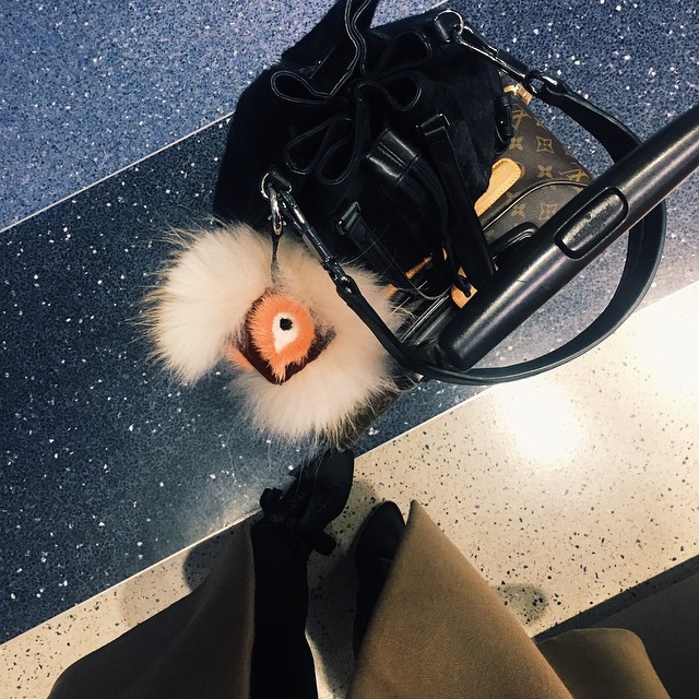 LONDON. LV luggage, @ElizandJames backpack, @Fendi keychain, Céline Coat, Alaïa ...