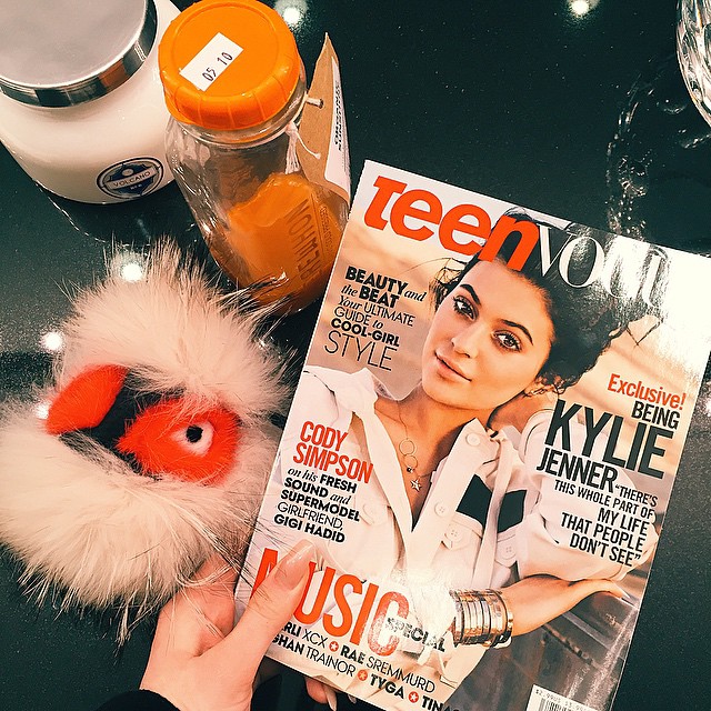 my friday essentials. Pressed juice, Teen Vogue, and my little fluff, of course....