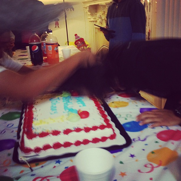 This is my friend Johnny getting literally cake-faced....