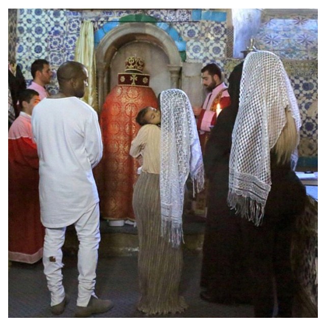 Baptizing North in Jerusalem in an Armenian church with our new baby in my belly...