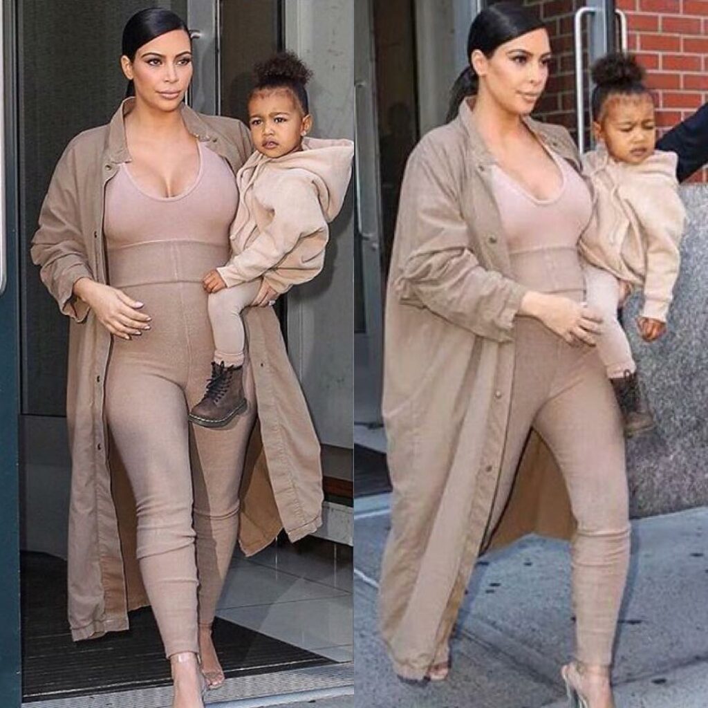 Wearing Yeezy Season2 leggings, bodysuit, coat and heels! North matching mommy i...