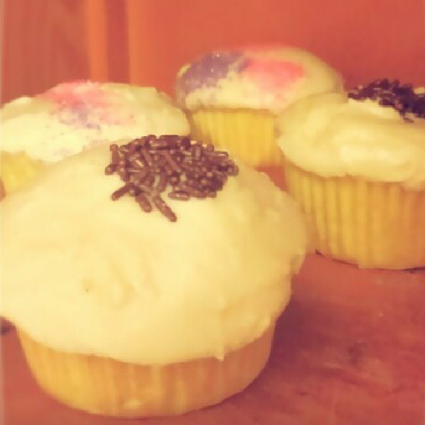 Midnight baking. Vegan vanilla bean cupcakes with homemade almond “buttercream" ...