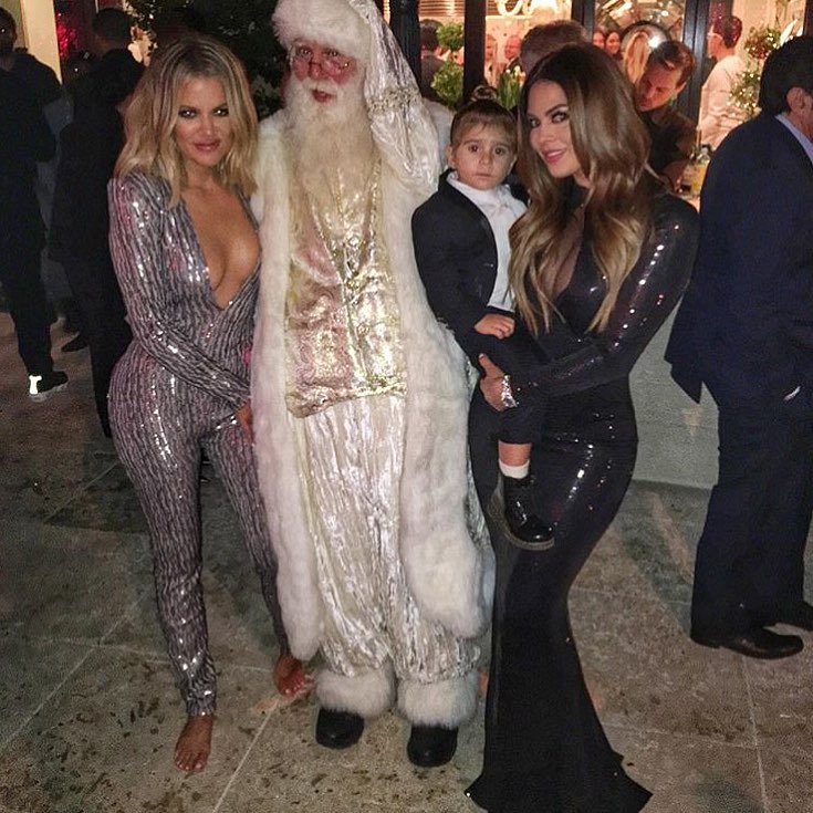 I found a picture with Santa!!! I loved my jumpsuit last night!!! @michaelcostel...