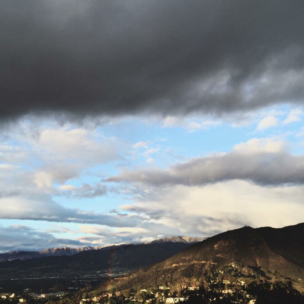 Sometimes there are clouds and mountains and sunshine and a rainbow all at once....