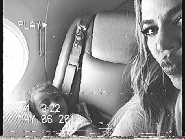 Home  (chill out people... She's in a booster car seat. I can hear you already! ...