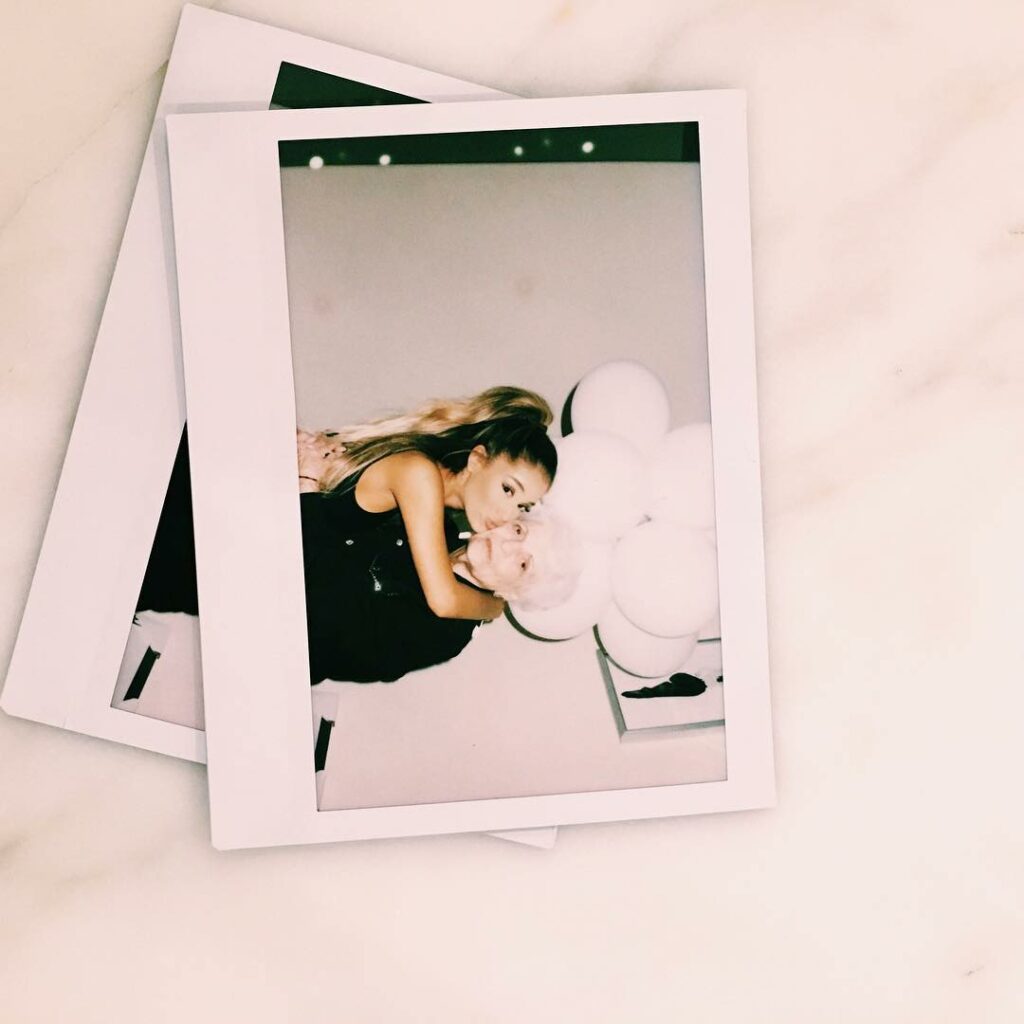 she wants you to know the balloons are not her hair...
