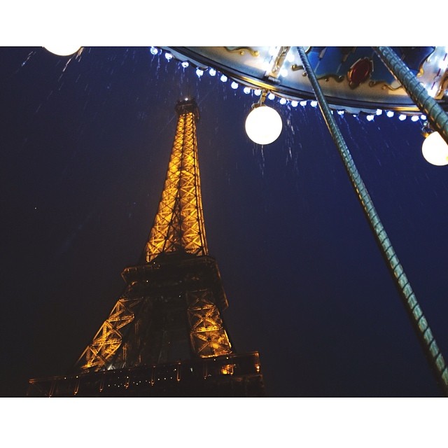 on a carousel, in the pouring rain, under the Eiffel Tower...I can check that of...