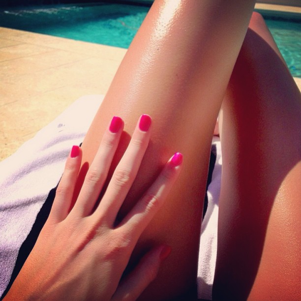 pink and sparkly nails  and my long ass fingers ...