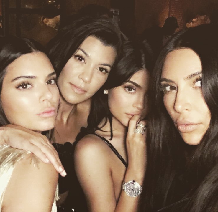 Sisters waiting to surprise Khloe......