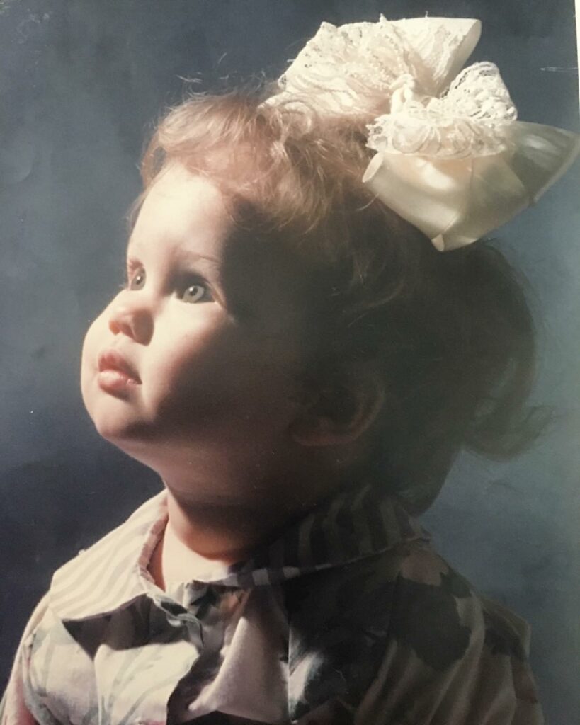 my mom made that bow the size of my face on purpose. walmart photo studio hit ya...