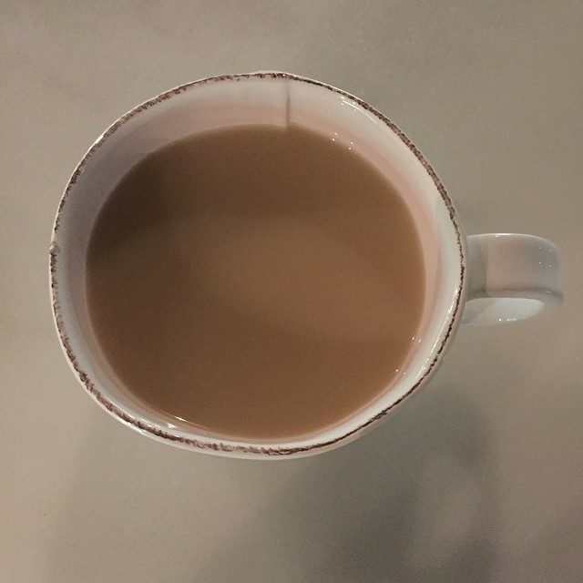 Hot spot of tea before bed with organic whole milk and raw wild honey. ...
