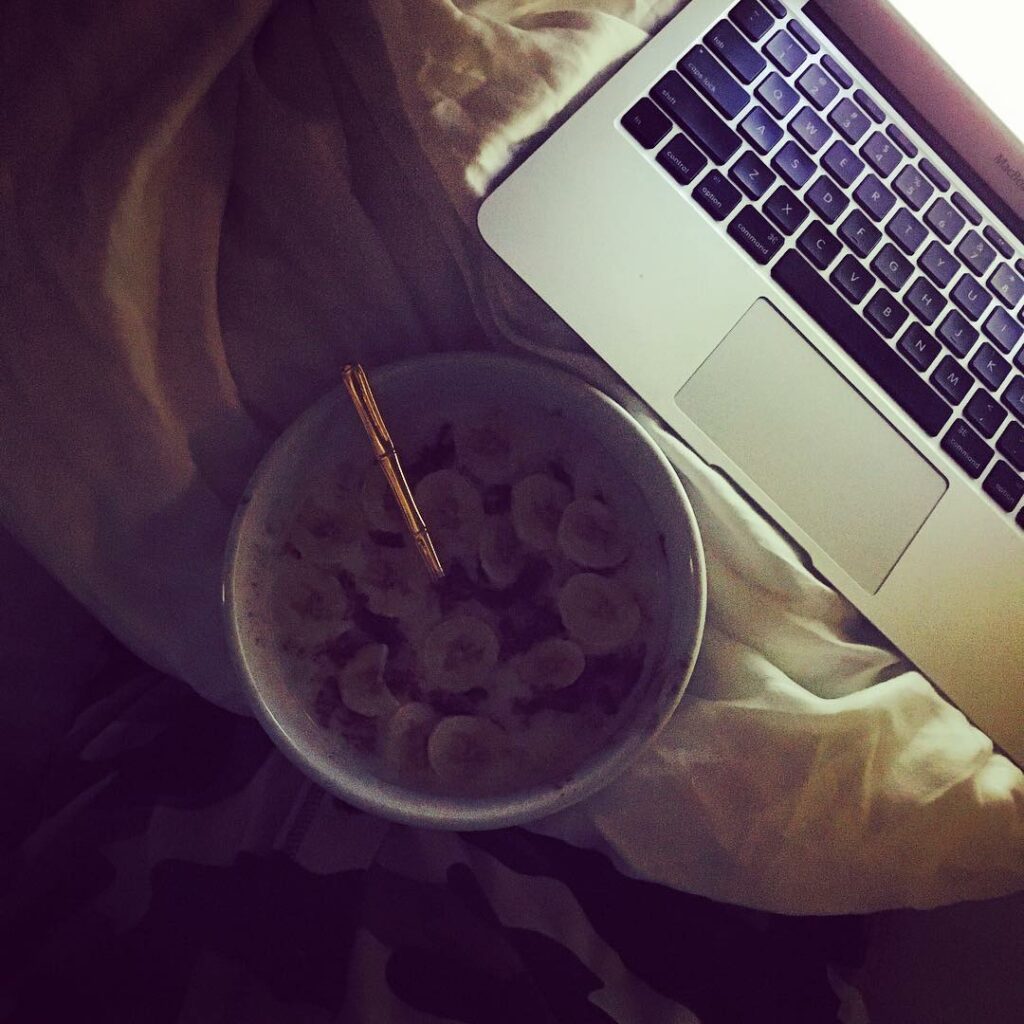 Breakfast in bed in my camo onesie....