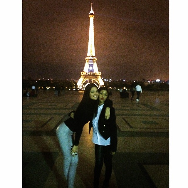 She's as tall as the Eiffel if she wasn't leaning over.  #paris...