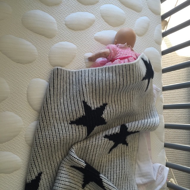 Nap time! Someone's already using our new crib....