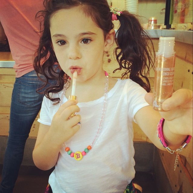 My little girly girl friend putting on some @kbeautyofficial lip gloss. ...