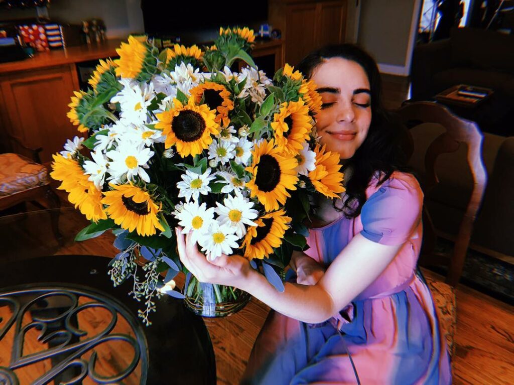 here she is, my best friend, GLOWING, (and blending right in) with the flowers t...