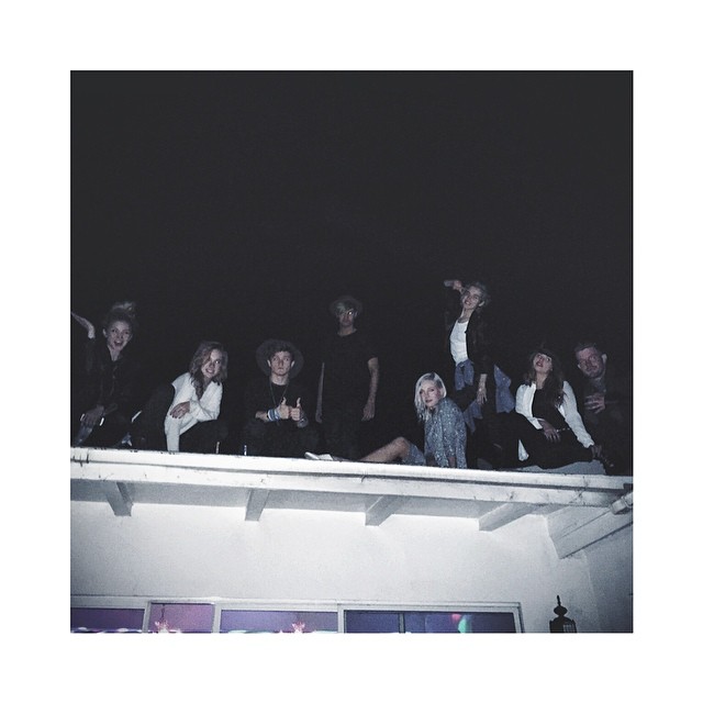 friendsgiving // friends taking fireworks to the roof...