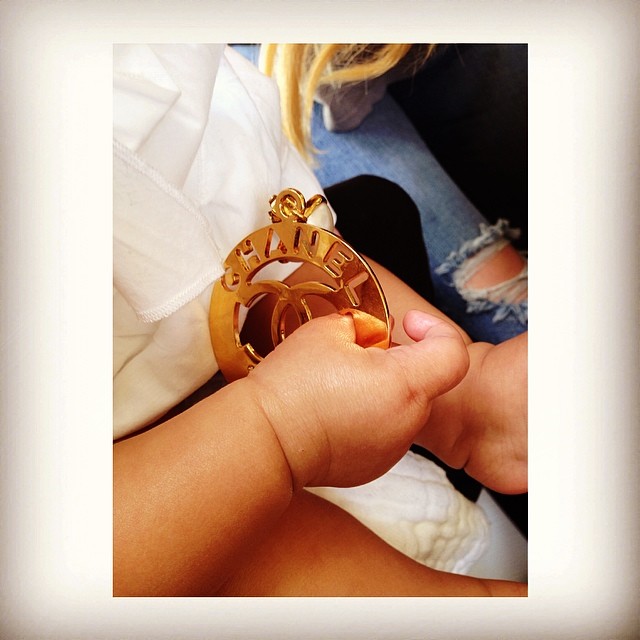 This little cutie stole my earring! I ain't mad at you North! #AuntieKoKo...