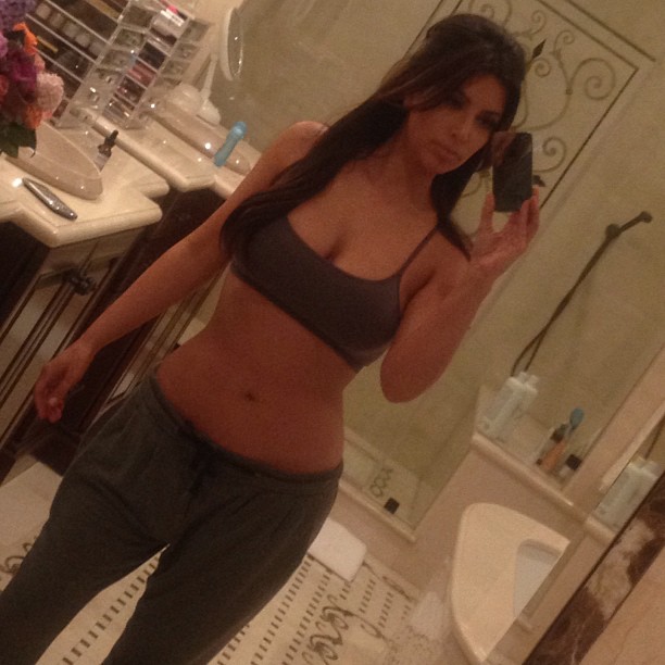 Sweatpants hair tie chillin with no make up on...
