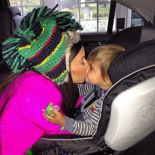 Traded his hat for a kiss!...