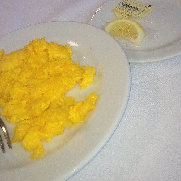 At brunch with KoKo... How is it that the eggs are fluorescent yellow?...