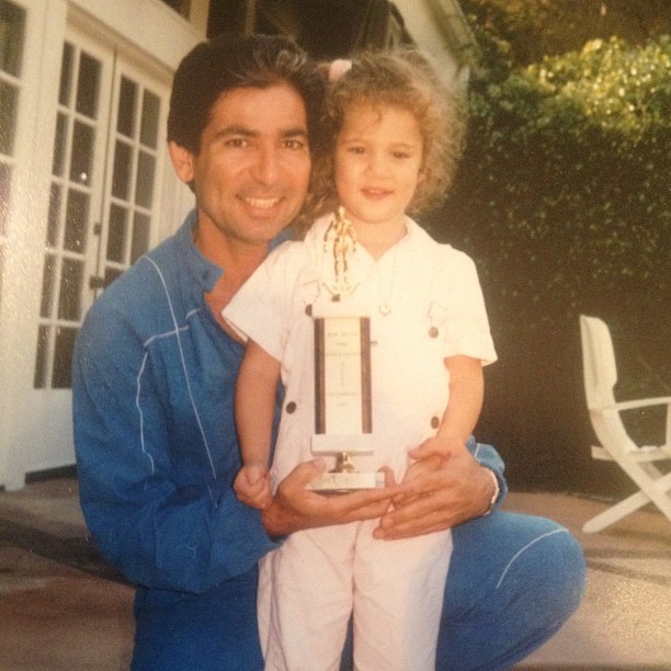 Another @khloekardashian classic! KoKo & daddy!...