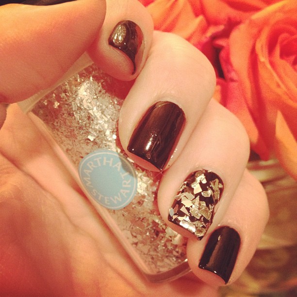 Martha Stewart glitter that I sprinkled on my wet nails. Kind of looks like shat...
