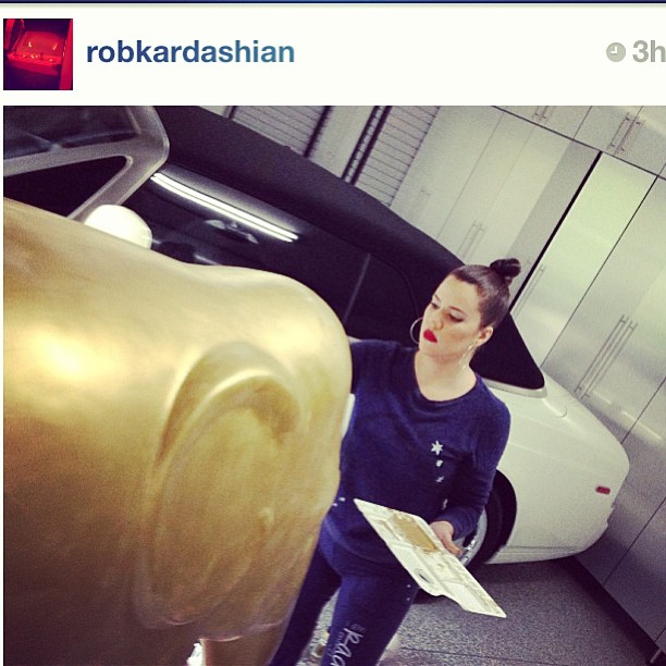 He snapped a pic of me painting the 2nd coat of gold paint! One more to go befor...