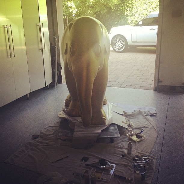 Four coats of gold paint later and now it's time for the details. #ElephantParad...