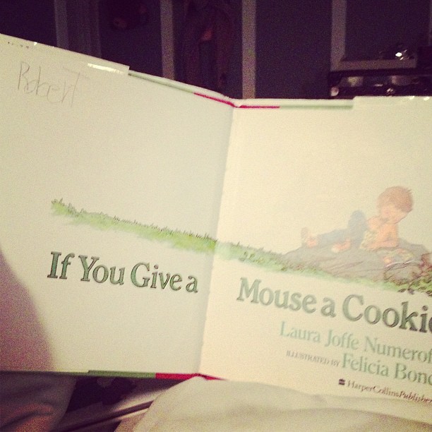 Nap time! Reading an old book of my brother's. @robkardashian...