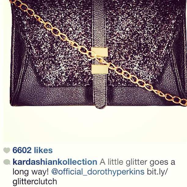 obsessed with our new glitter clutch! @kardashiankollection...