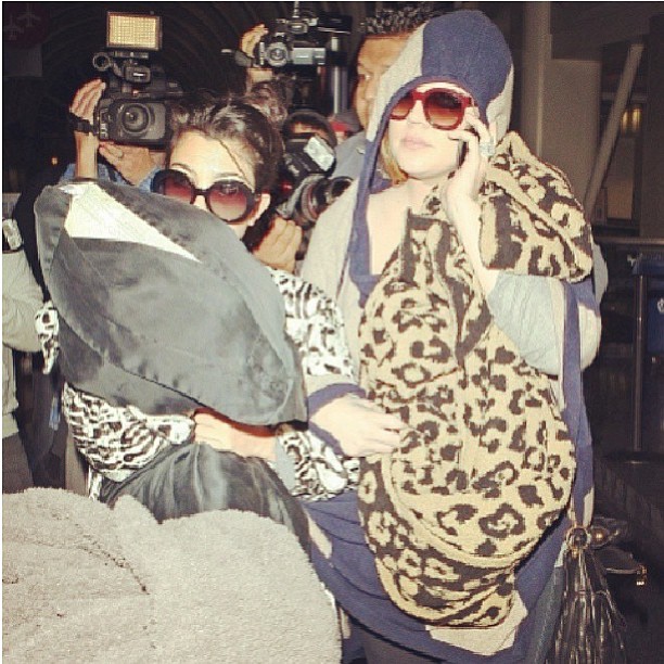 Half asleep we handled this paparazzi moment pretty fiercely. @khloekardashian...
