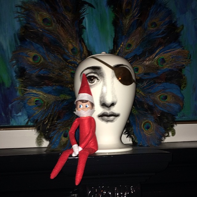 Elf on the fireplace....