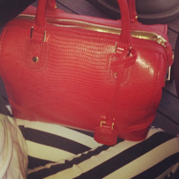 Striped jeans and my gorgeous red bag from @alice_olivia!...