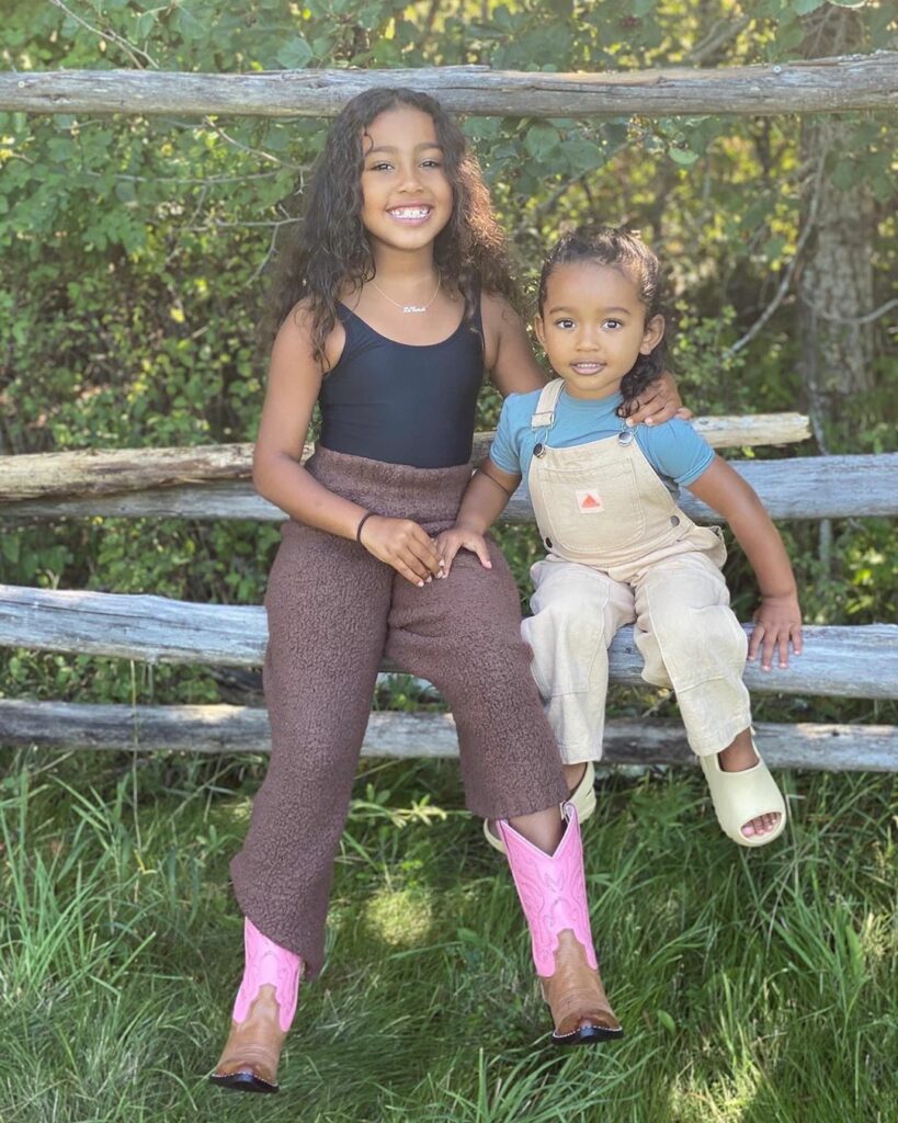 My girls wanted to do a photo shoot together sitting up on this rail. Swipe to t...