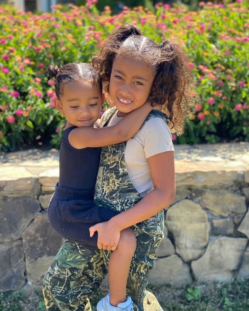 My Girls . Swipe to see North trying to teach Chi to make a peace sign. ...