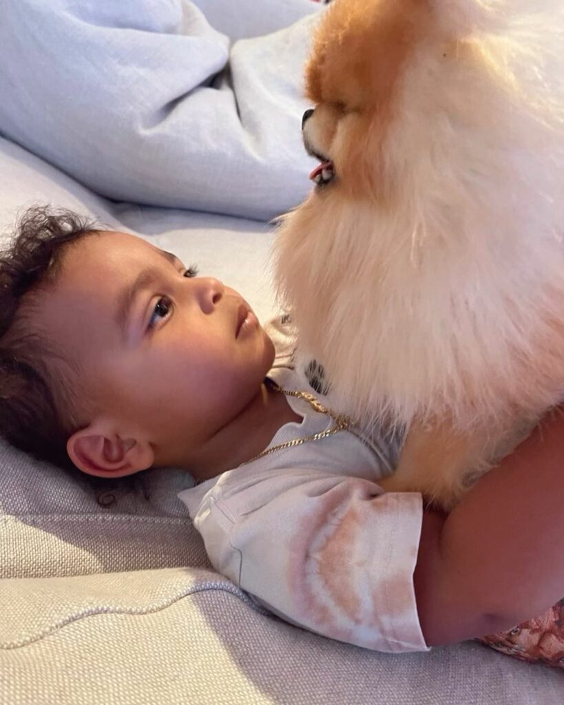 Psalm and our stuffed Pom doll lol...