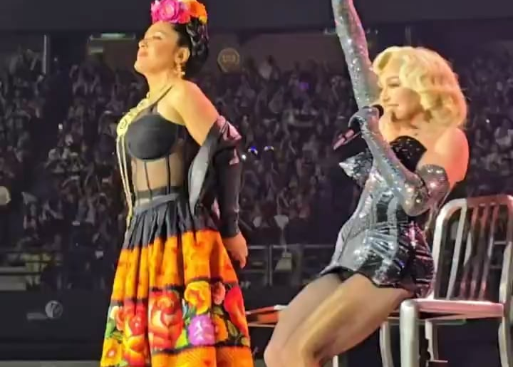 Madonna with Salma Hayek dressed as Frida Kahlo yesterday in Mexico City at Madonna’s concert