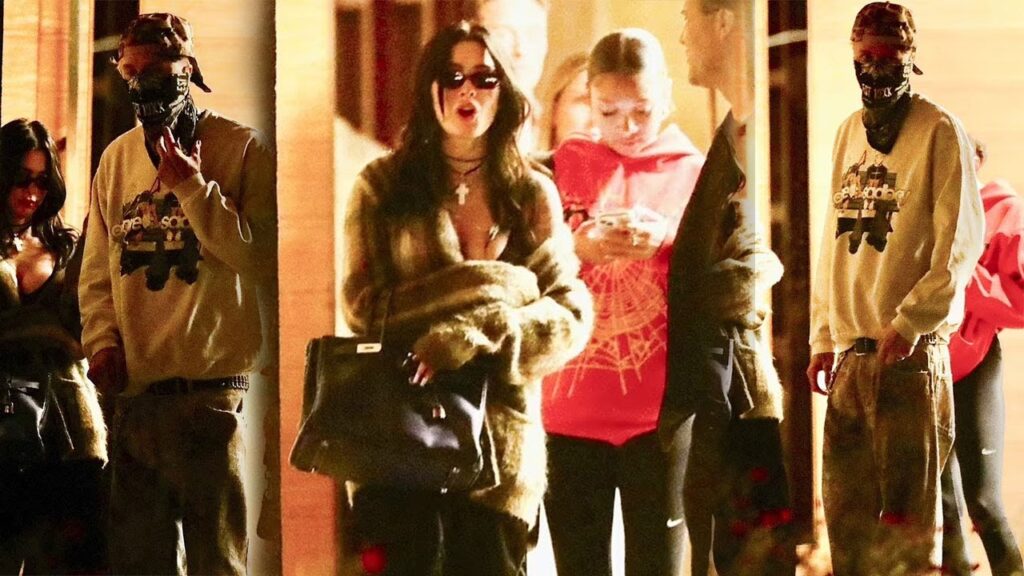 Megan Fox conceals stomach in sweater during dinner with Machine Gun Kelly after pregnancy rumors