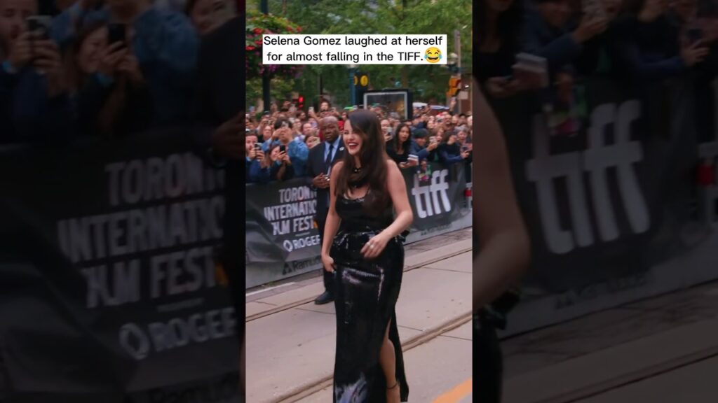 Selena gomez laughed at herself fot almost falling😂#selenagomez #shorts #tiff #tiffpremiere #fyp