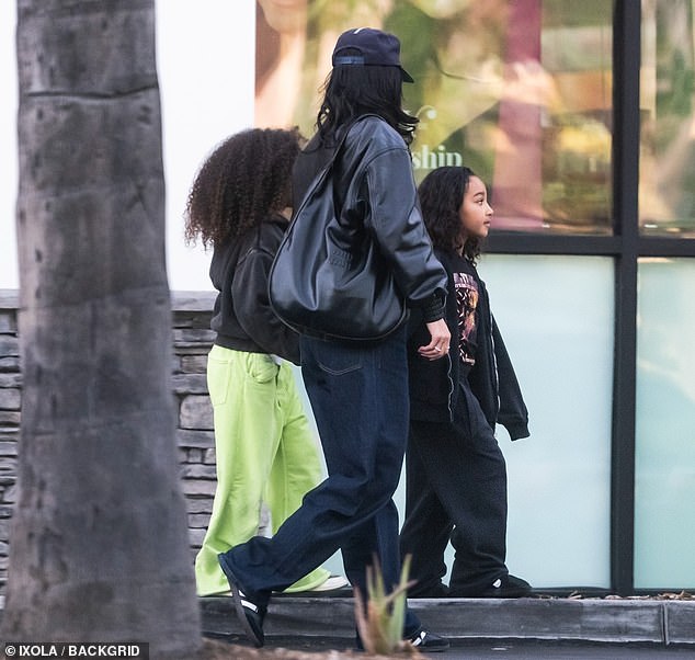 She was with two children: her daughter, Stormi Webster, six, and her niece, Chicago West, whose mother is Kylie's older half-sister Kim Kardashian. They were exiting an Ulta Beauty store in Calabasas which carries Kylie Cosmetics and her perfume Cosmic