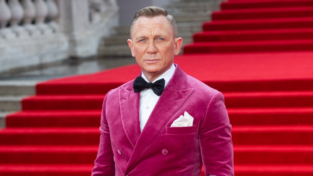 Why Anderson & Sheppard Is the Favorite Tailor of Celebrities and Royals Time to dye. Daniel Craig attends the "No Time To Die" world premiere at Royal Albert Hall in 2021 dressed in deep pink Anderson & Sheppard.