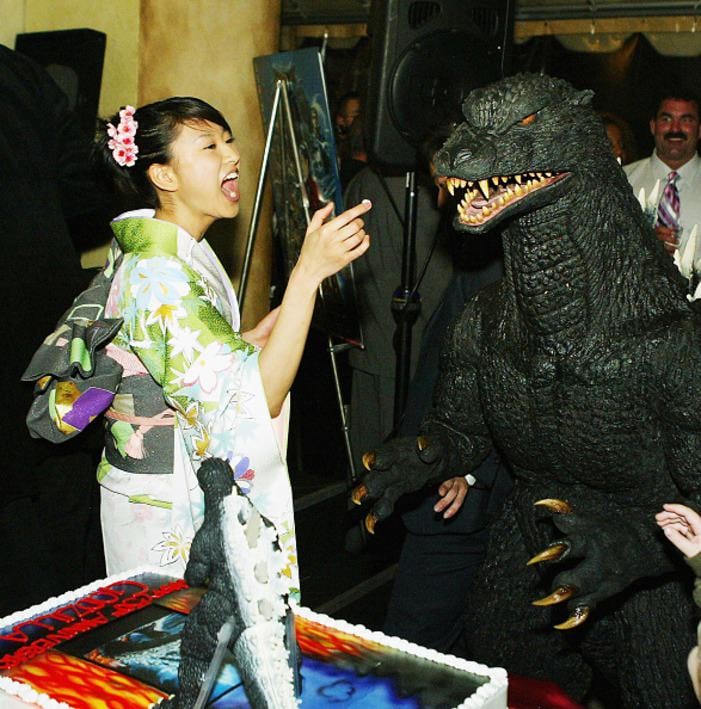 Rei Kikukawa Feeding Godzilla Cake at the Premiere of Godzilla: Final Wars (2004)