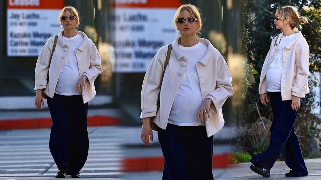 Pregnant Jennifer Lawrence shows off growing baby bump in a T-shirt during LA lunch🤰